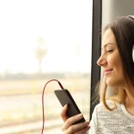 The Best Music to Listen to While Traveling for Business