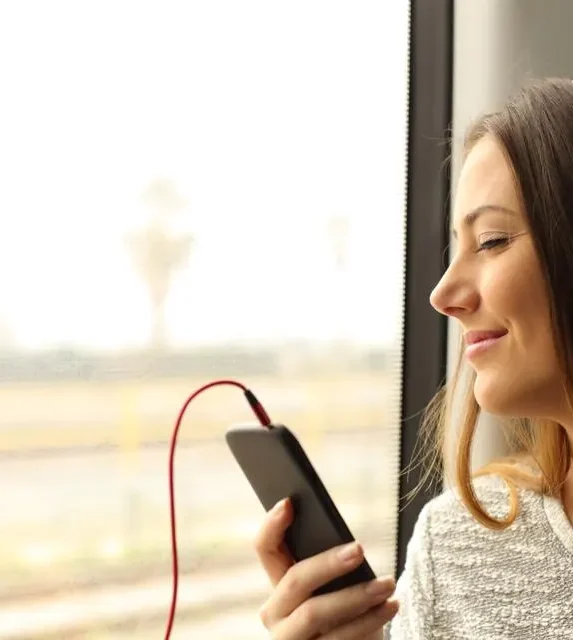 The Best Music to Listen to While Traveling for Business